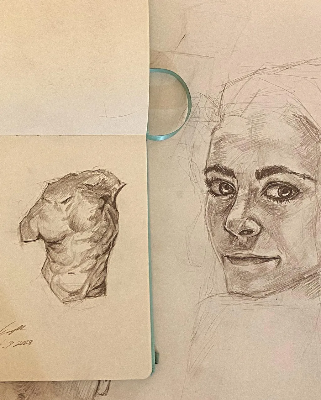 Sketchbook spread with a pencil torso sculpture study and a woman's portrait