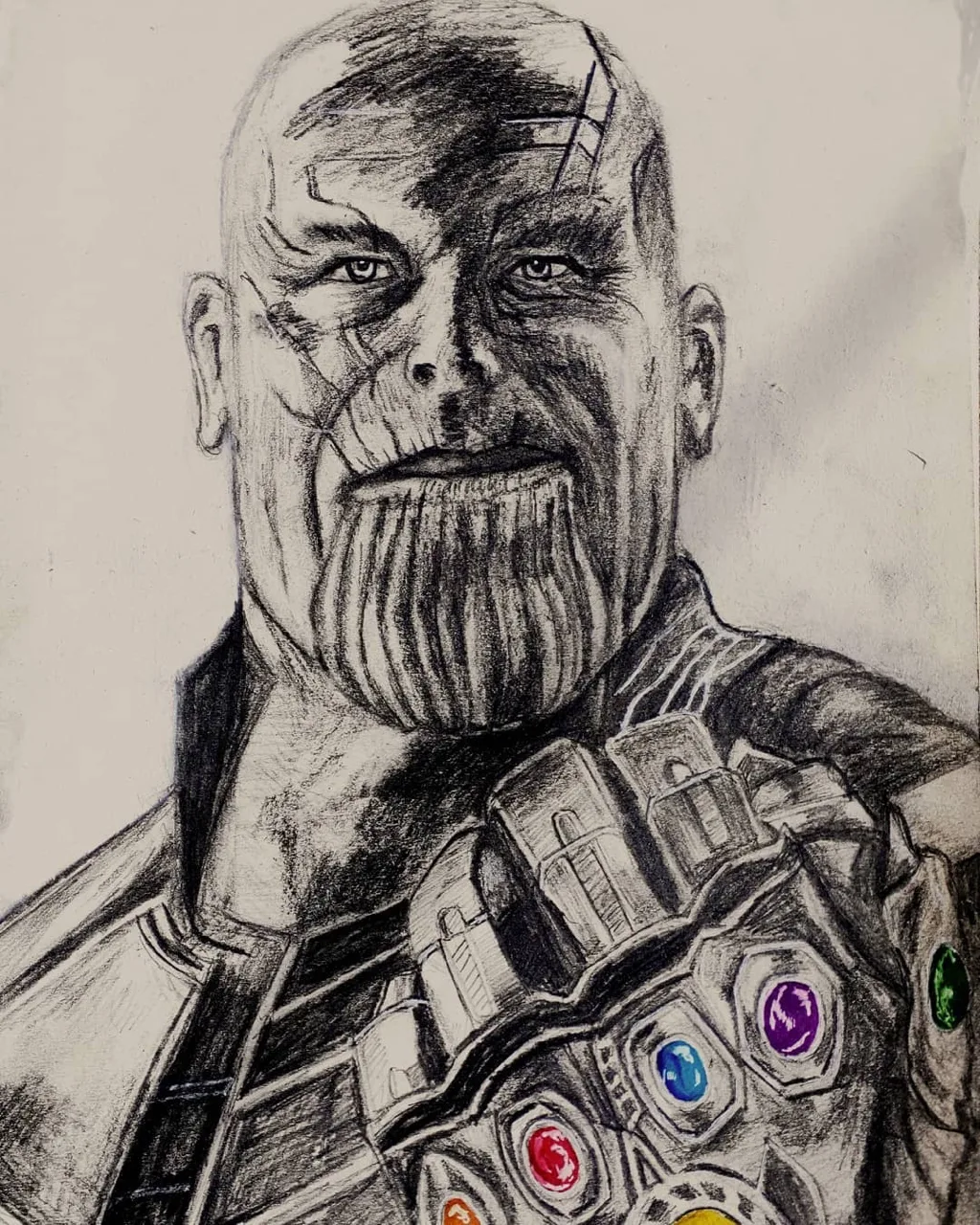 Graphite drawing of Thanos wearing the Infinity Gauntlet with colored stones