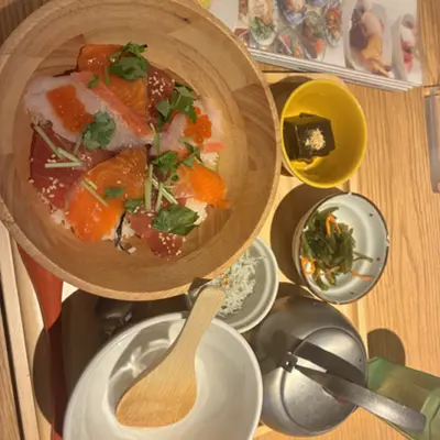 Seafood rice bowl set with salmon and roe and side dishes