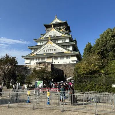 Osaka Castle against a blue sky