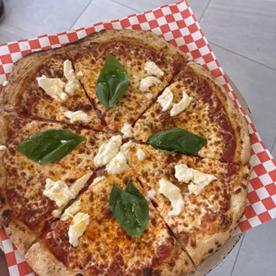 Margherita pizza with fresh mozzarella and basil